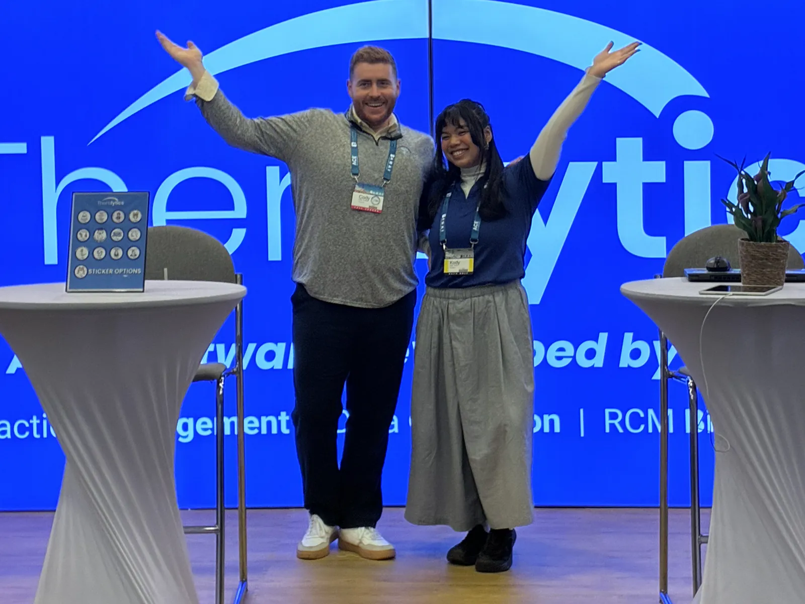 Two Theralytics team members at the company's ABA conference booth