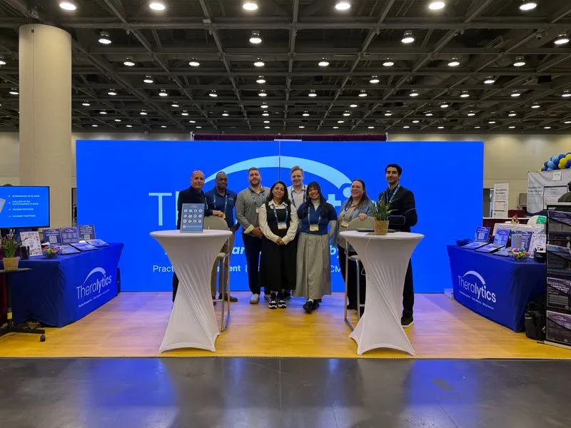 The Theralytics team gathered at its booth during an ABA conference